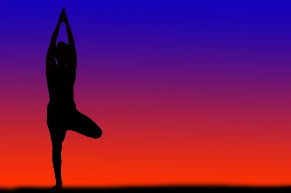 Woman practicing yoga — Stock Photo, Image