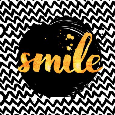 Golden calligraphy with ink drops.