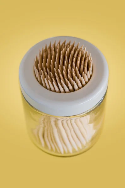 Wooden toothpicks in plastic container — Stock Photo, Image