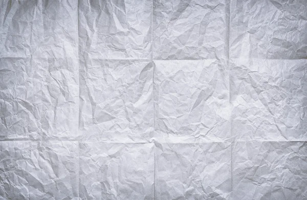 Folha de papel dobrada e enrugada — Fotografia de Stock