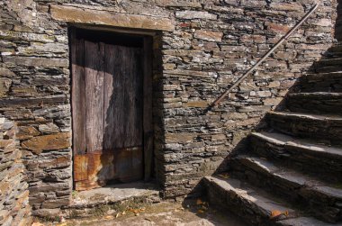 door in old stone house clipart