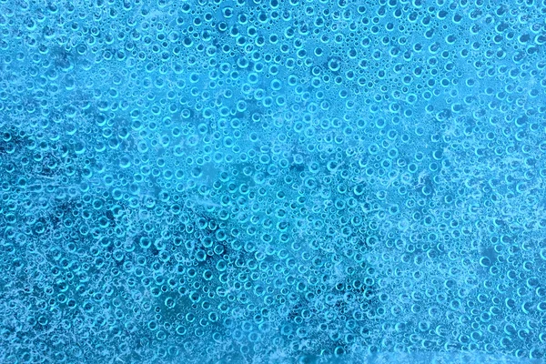 Gotas de água em azul — Fotografia de Stock