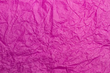 Yakın planda mor buruşuk kağıt