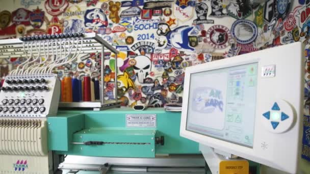 Control panel of embroidery machine with Akbars logo — Stock Video
