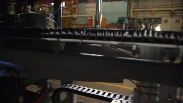 Automatic equipment operates with metal sheet in workshop — Video Stock