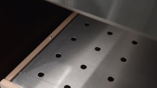 Metal shelf with holes for domestic refrigerators production — Video Stock
