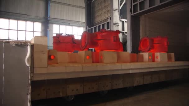 Red casings of air compressors cool down in workshop — Stock Video