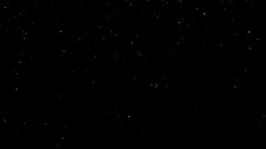 Noel kar taneleri kıvrılır ve yavaşça siyah bir arka plana düşer. Noel ve Yeni Yıl dekorasyonu 