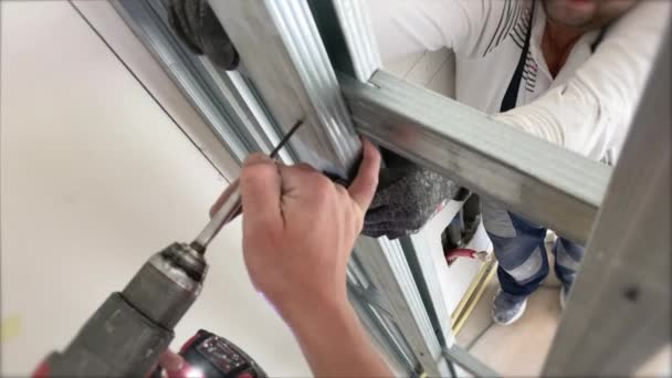 Builders Installing Metal Construction Profiles Assembling Plasterboards Construction Site Apartment — Stock Video