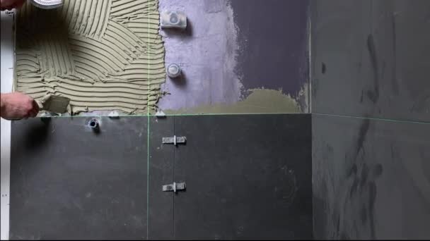 Tiler Applies Adhesive Floor Install Ceramic Tiles Laying Tiles Construction — Stock Video