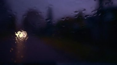  Rainy Night Car Headlights Bokeh Through Wet Glass