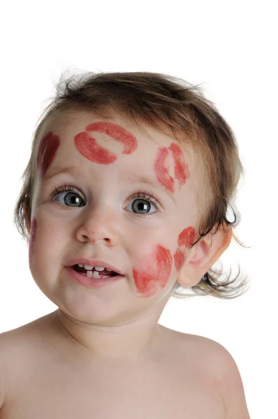 Sweet baby, with traces of kisses on his face — Stock Photo, Image