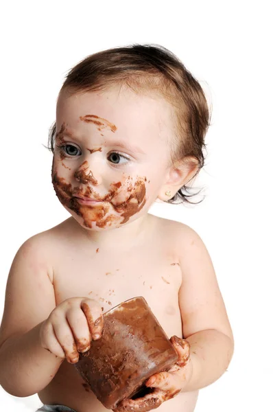 초콜릿을 먹는 즐기는 순간, 아기 — 스톡 사진