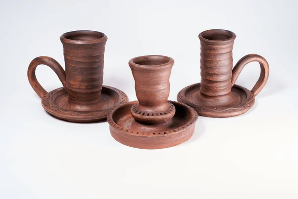 Pottery Craft, ceramic product with your own hands, made on a Potter\'s wheel, isolated on a white background, clay.