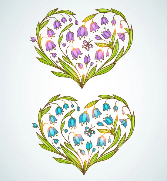 Corazones florales azules y violetas — Vector de stock