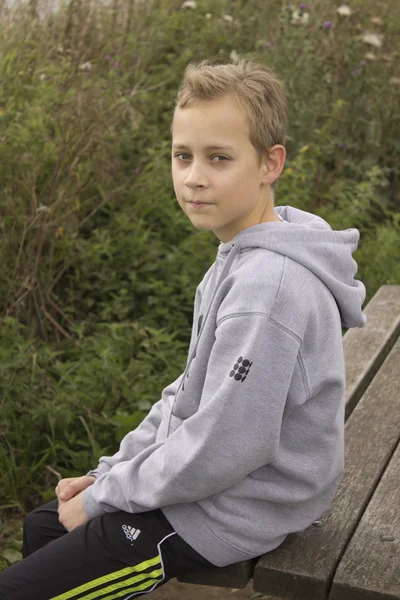 Teenage boy at the park — Stock Photo, Image