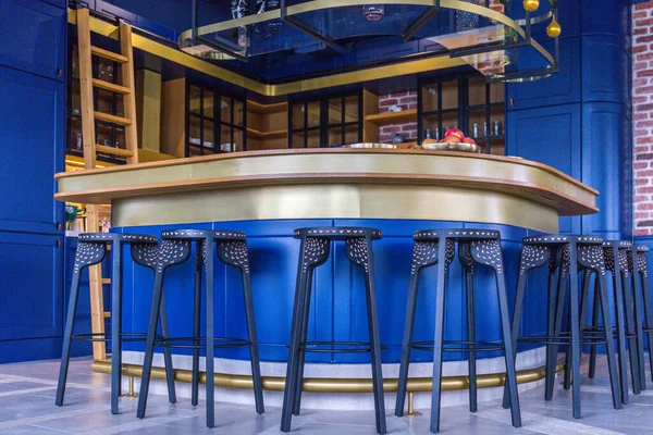 Modern kitchen, with club chairs and bar, blue combination
