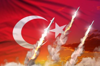Türkiye balistik füze fırlatması - günbatımı arka planında modern stratejik nükleer silah konsepti, bayraklı askeri endüstriyel 3D illüstrasyon