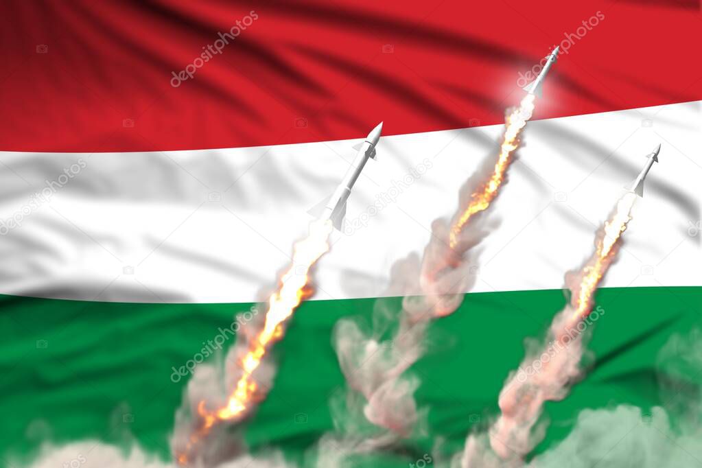 Hungary supersonic warhead launch - modern strategic nuclear rocket weapons concept on flag fabric background, military industrial 3D illustration with flag