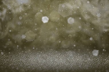 Sarı, parlak, soyut arka plan ışıltılı ışıklar ve düşen kar taneleri odak dışı bırakılmış bokeh - içeriğiniz için boş boşluğu olan tatil modeli dokusu
