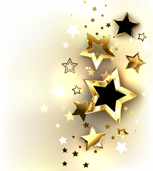 Golden, sparkling stars on a light background. Design with gold stars