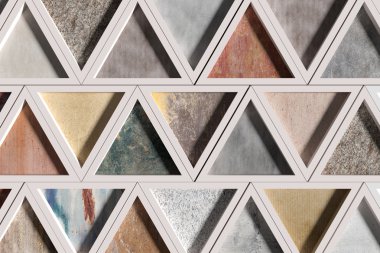 Duvar beyaz karelerdeki farklı malzemelerin üçgen ile