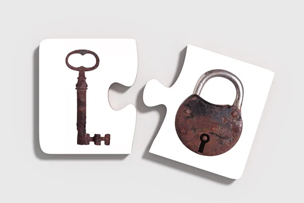 ปริศนาสองชิ้นพร้อมกุญแจและกุญแจ — ภาพถ่ายสต็อก