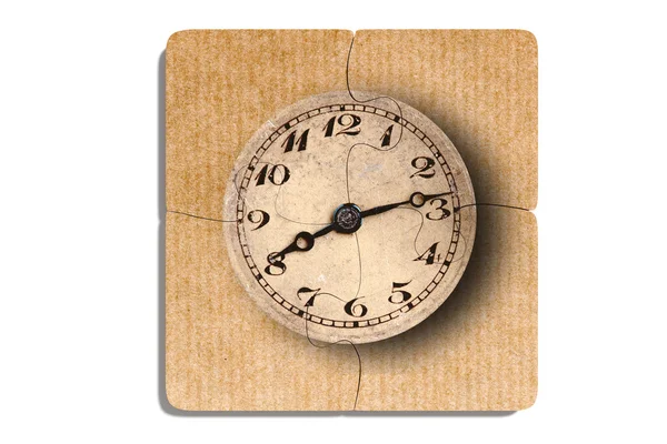 Old-fashioned clock print on puzzle pieces — Stock Photo, Image