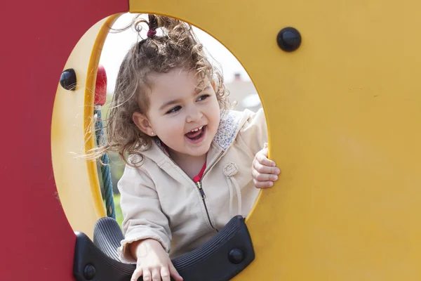 Glad liten unge på lekplats — Stockfoto