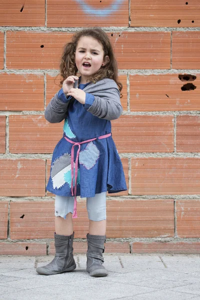 Portrait of angry homeless girl — Stock Photo, Image