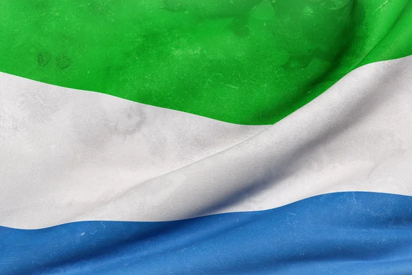 Republik Sierra Leone Flagge schwenkend — Stockfoto