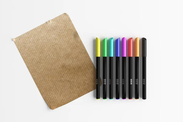 Penne colorate con foglio di carta — Foto Stock