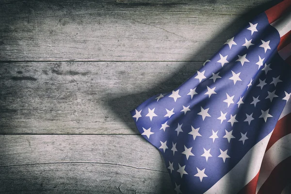 Usa flag on a wooden surface — Stock Photo, Image