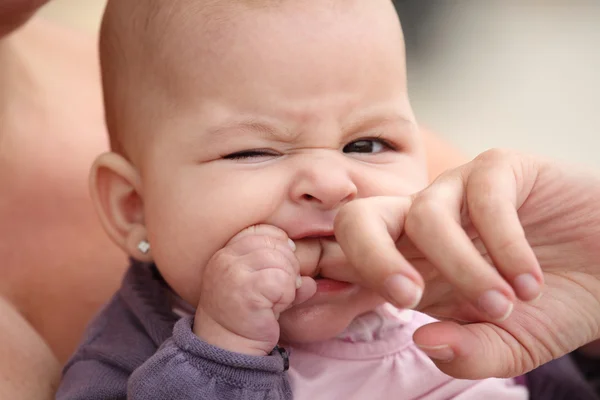 Baby biting — Stock Photo, Image