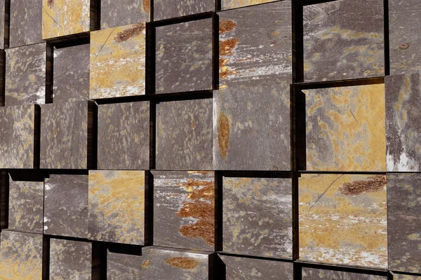 3D-rendering av en massa texturerat stenar kuber — Stockfoto
