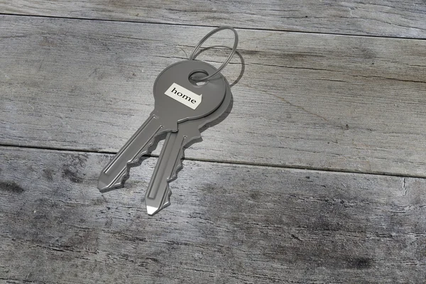 3d rendering of some keys on a wooden background — Stock Photo, Image