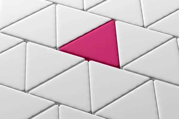 Крупним планом один рожевий трикутник серед білих трикутників — стокове фото