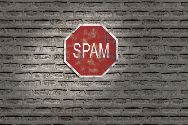 3d representación de una señal de tráfico de spam en la pared de ladrillo.Illustratio — Foto de Stock