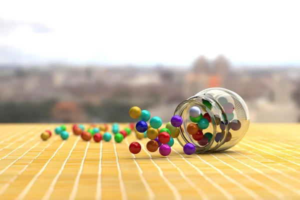 Colorful candies scattering out of glass jar — Stock Photo, Image