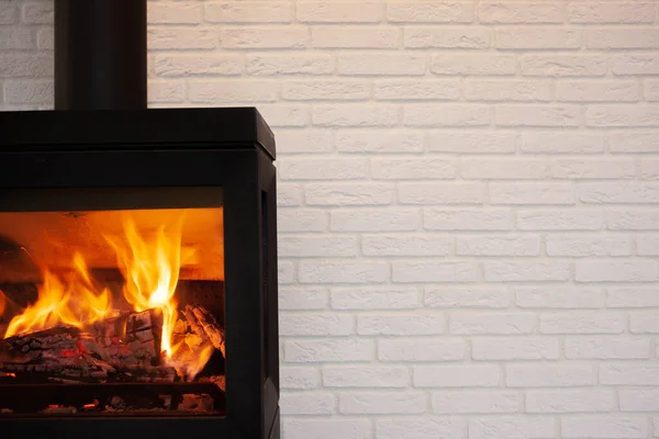 Moderm Style Cast Iron Fireplace White Brick Background Royalty Free Stock Images