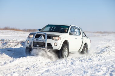 KHABAROVSK, RUSSIA - JANUARY 31, 2015: Mitsubishi L200 during of clipart