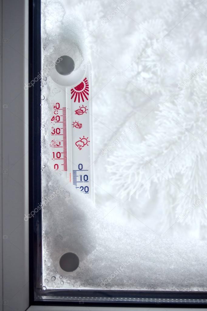 Outer thermometer on a frozen window