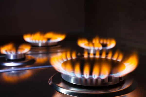 Orange flame at gas stove — Stock Photo, Image
