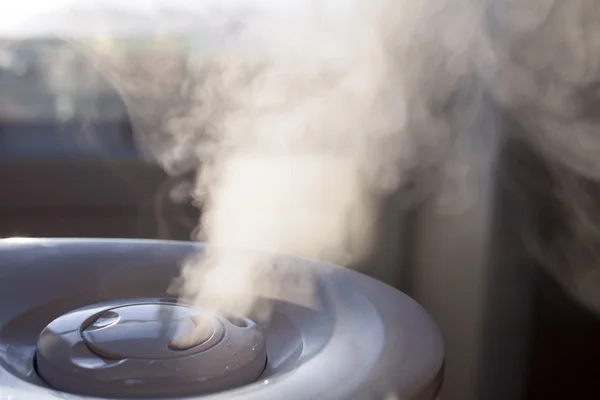 Vapor from humidifier in the morning light — Stock Photo, Image