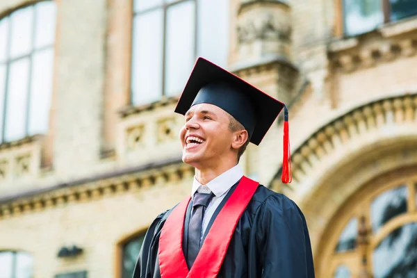 Portrait of a happy graduate male student - graduation concepts — Stock Photo, Image