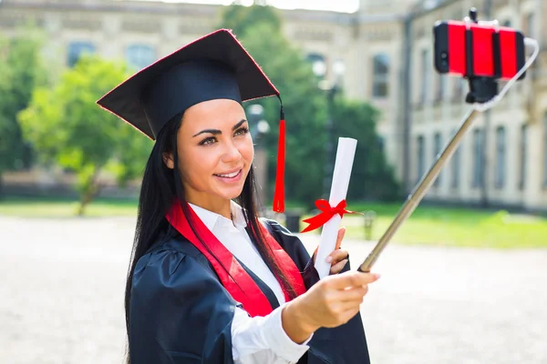 Girl graduate get selfie photo with smartphone — Stock Photo, Image