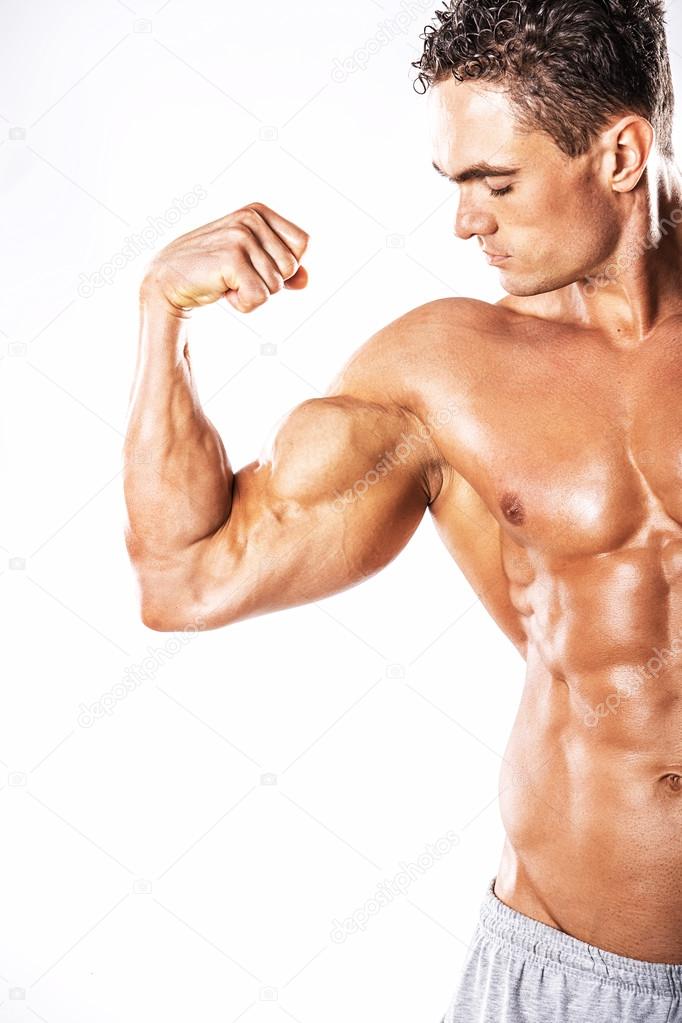 Man showing muscular strained biceps