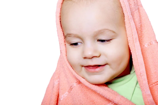 Smiling baby wrapped in a pink towel isolated — Stock Photo, Image