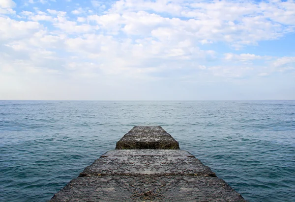 Dreaming on a empty concrete pier — Stock Photo, Image