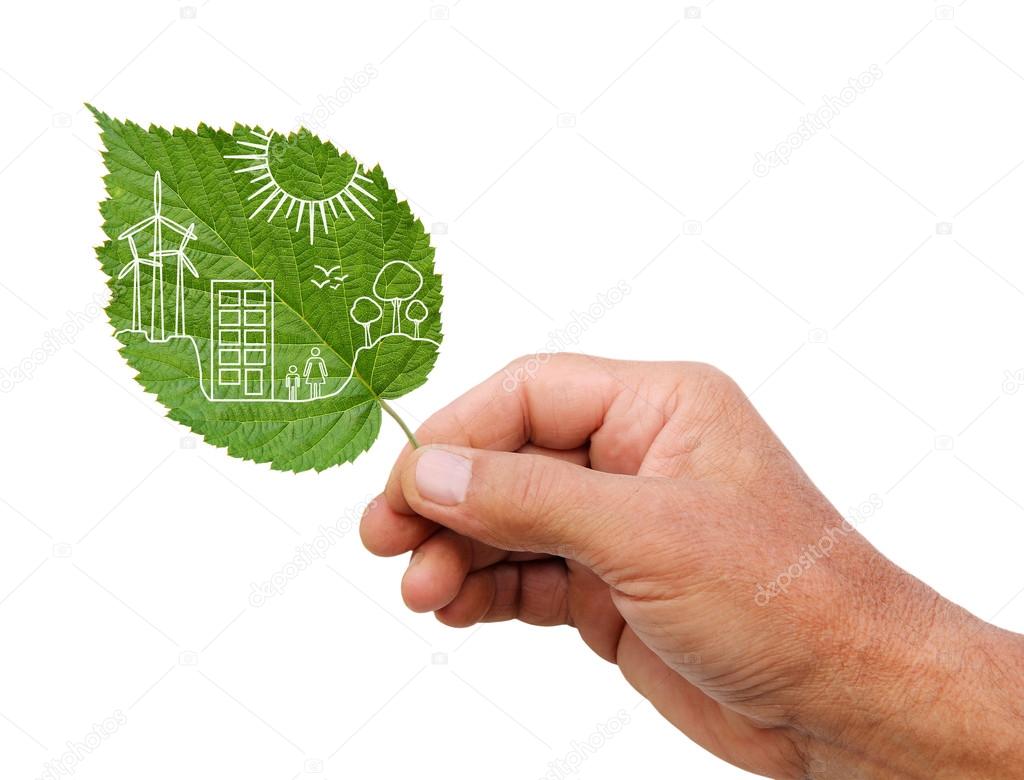 Eco house concept, hand holding eco house icon in nature